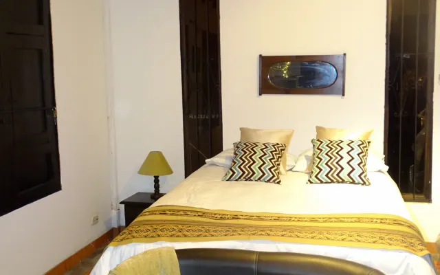 Quarto agradável / varanda