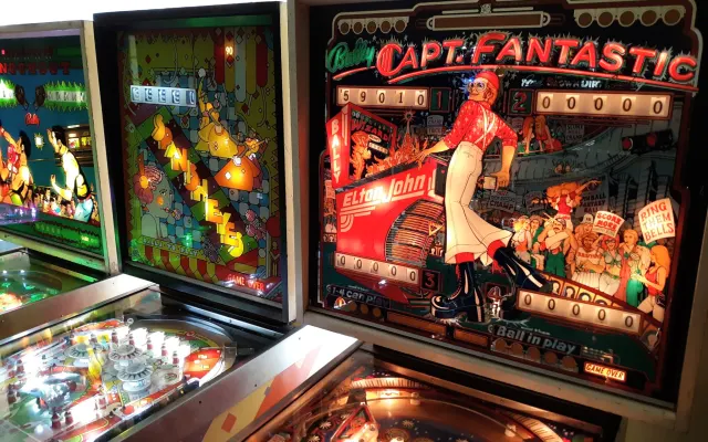 Basic Room, clean, safe place with vintage pinball and game consoles.