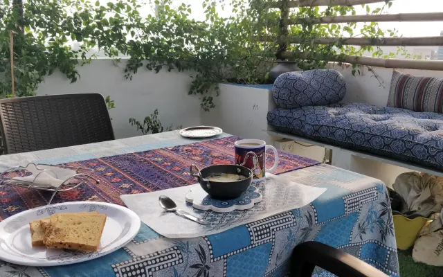 Guest room with a shared kitchen , terrace and balcony