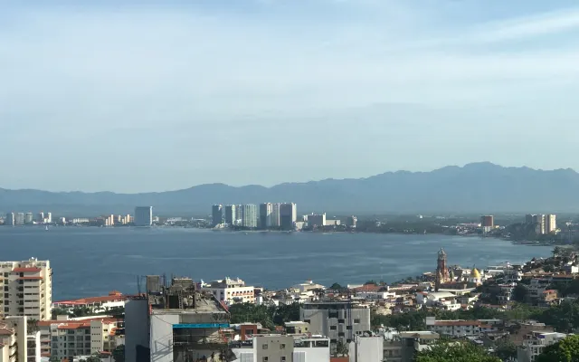 Romantic Zone Ocean View Condo w/Private Rooftop