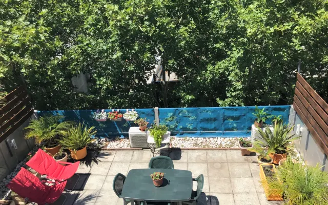 Oasi in città: attico con giardino