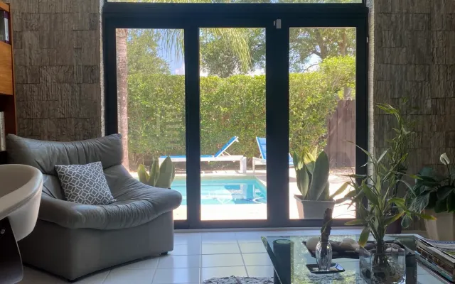 Shared large flat with private entrance park with a pool.