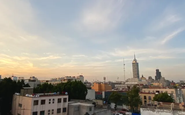 Quarto com localização central e excelente vista