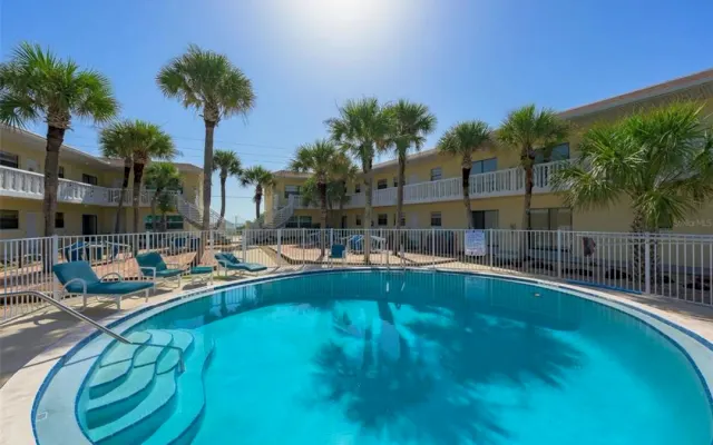 Entire 2 bedroom 1 bath beachfront condo with pool, quiet area