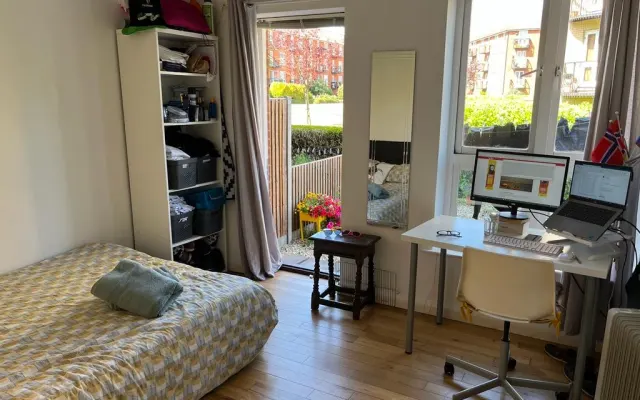 Queen bed with a patio