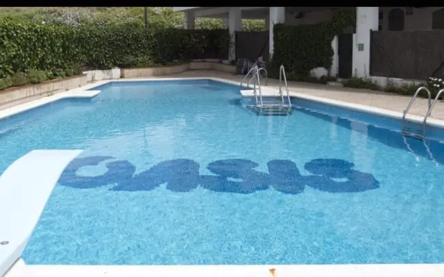 Central accommodation with elevator and swimming pool.