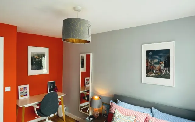 Quarto acolhedor na Casa del Corgi