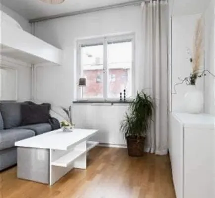 Cozy apartment close to the city with access to gym and sauna.