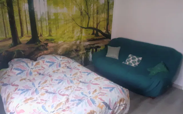 large bedroom with private bathroom in a quiet area.