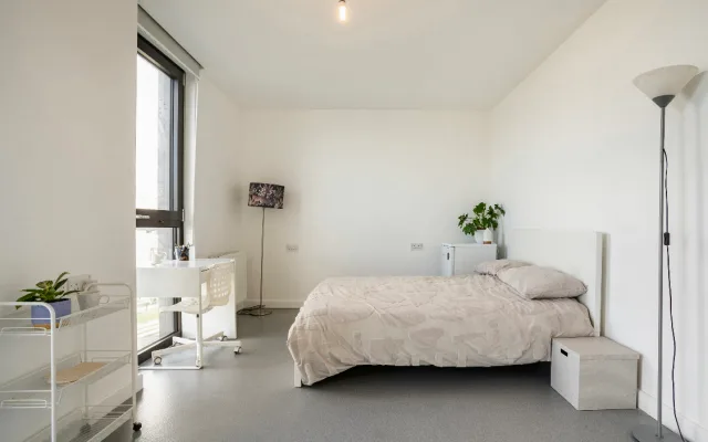 Beautiful riverside view room with sleeping to floor to ceilingwindows