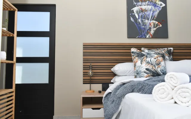 Quarto Deluxe e casa de banho privativa