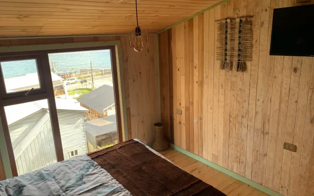 Belle chambre double au centre d'Ancud avec vue sur la mer
