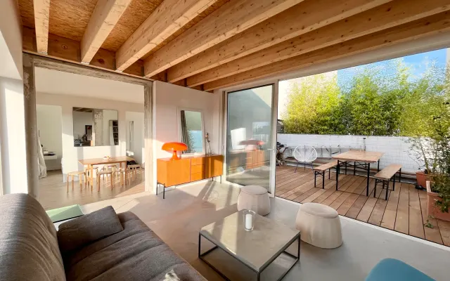 Apartment with windows overlooking Paris and terrace