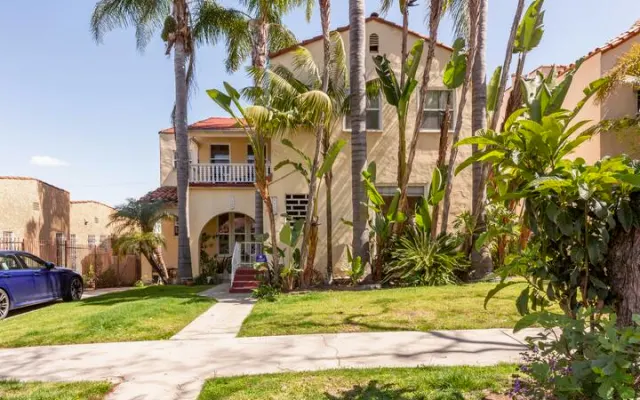 Bedroom and private bathroom in 1928 Spanish Revival Home