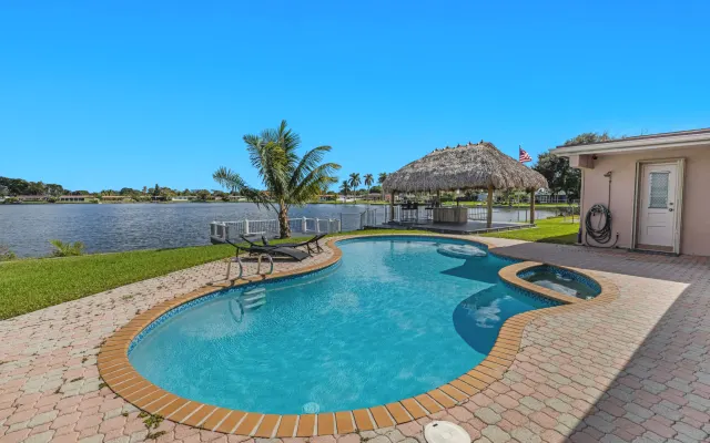 Casa de 4 quartos à beira-mar com piscina aquecida e spa