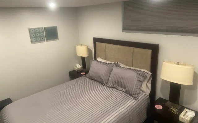 PoHo central Work stay vacay away bright bsmt apartment