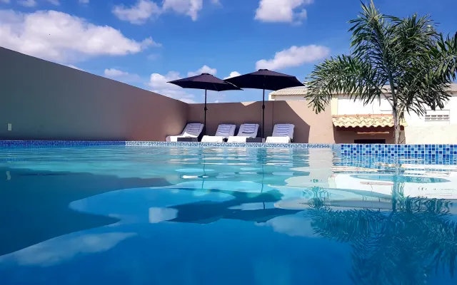 4 Clothing optional Island House Curacao comfort room pool and more.
