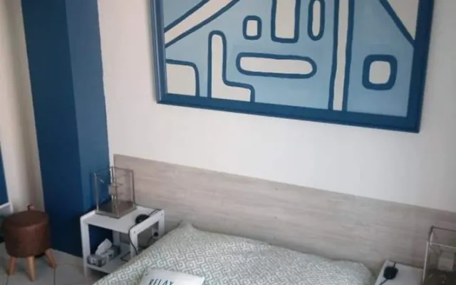 Habitación en una casa a 15 minutos a pie de la playa