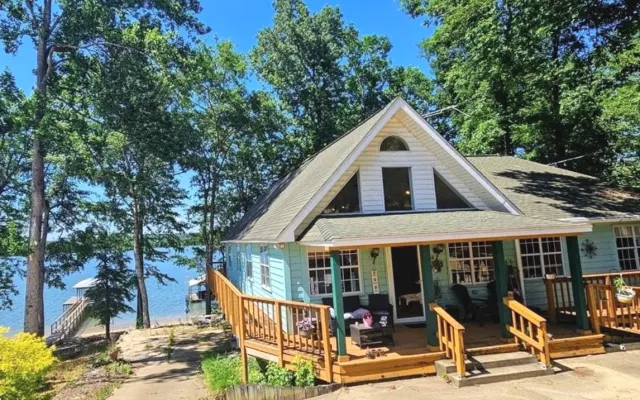 Luxury Chalet is  located on Lake Patula. With your own Beach and Dock
