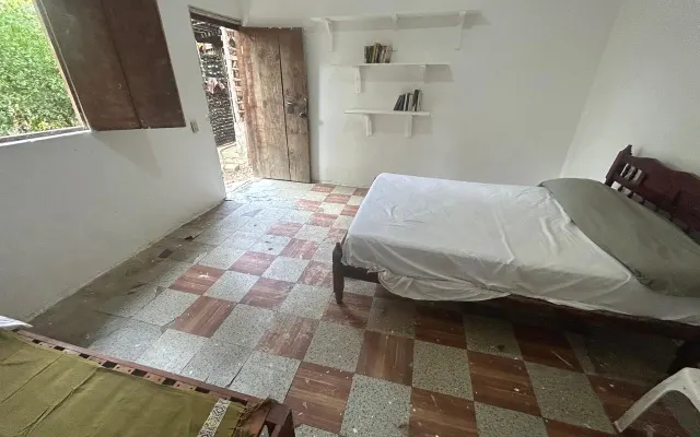 Grande chambre partagée dans le centre de Zipolite