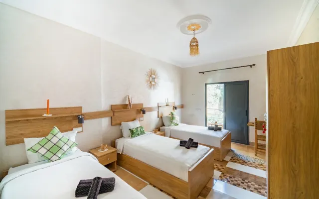 beds in a shared triple room