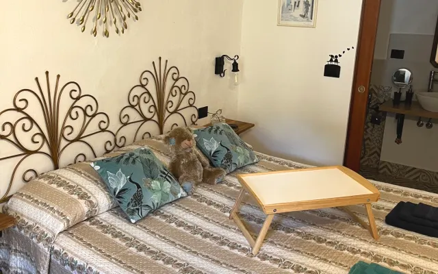 Quarto Privado Orquídea com Casa de Banho