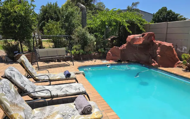 Our cozy guesthouse nested in a tranquil setting with warm hospitality