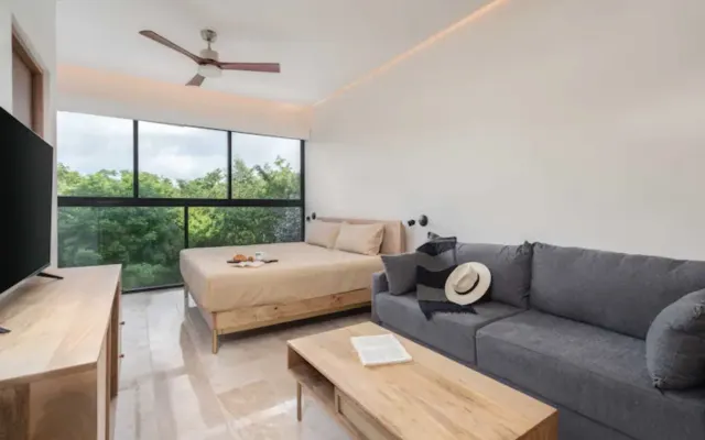 Relax & Explore: Comfy Stay Near Tulum Ruins with Pool
