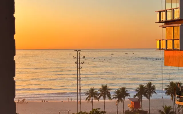 Suíte em apartamento frente a praia