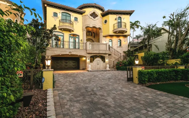 Luxury 3-Story Estate with Gym, Pool, & Direct Beach Access