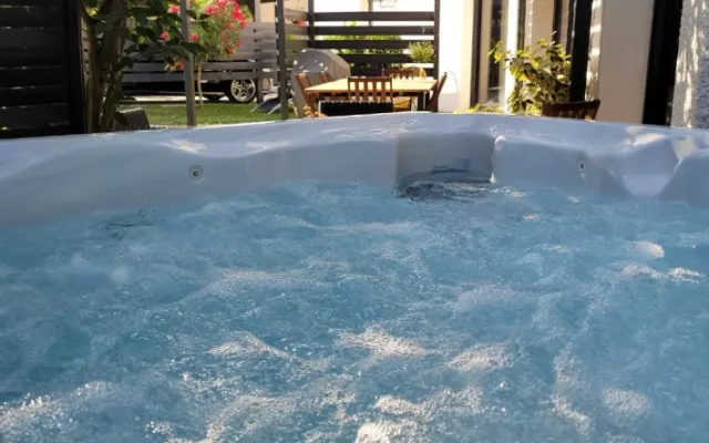 House with garden and jacuzzi.