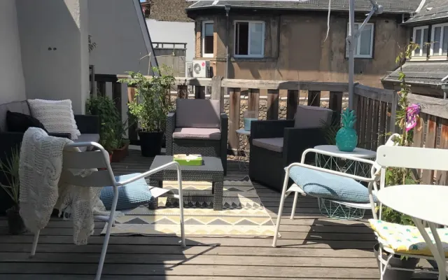 Chambre privée dans un charmant appartement du centre ville.