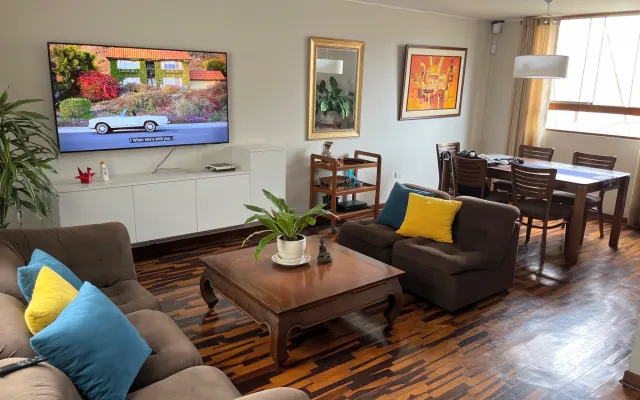 Sofa or room with bed in Miraflores