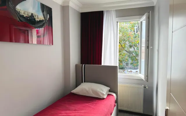 Chambre rouge - Séjourner avec un Italien (Chambre simple)