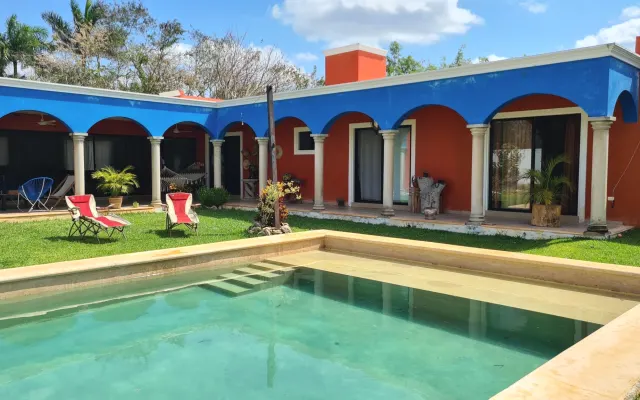 Zimmer in der Hacienda Cholul mit Pool und großem Garten