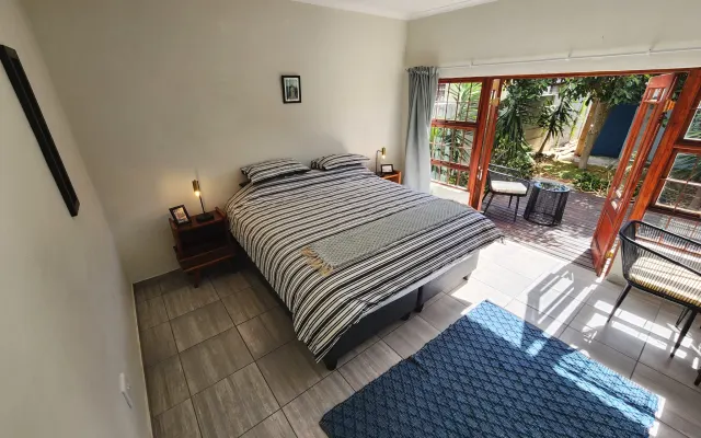 Flatlet beside pool area and near the beach