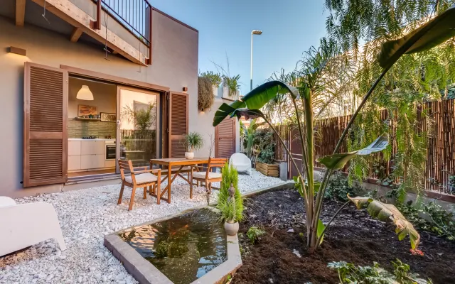 Loft-style one-bedroom garden flat in Pigneto