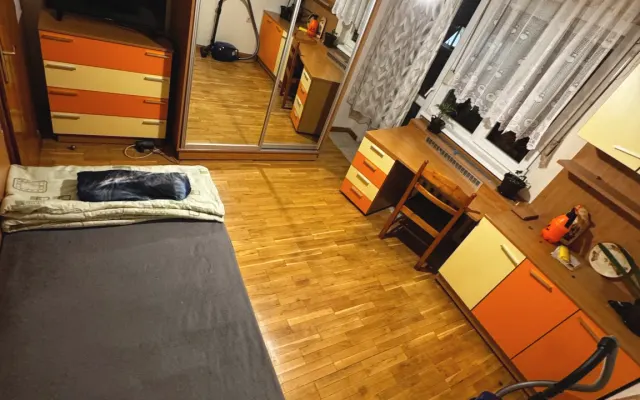 Beautiful room in the calm neighborhood 10 min. away from the center
