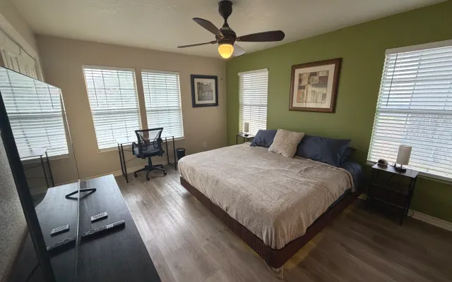 Private room & bath in house shared with host near airport