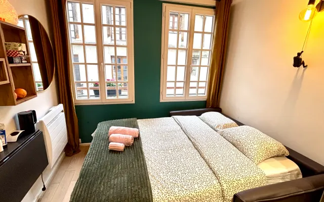 Encantador estudio en el corazón del Marais