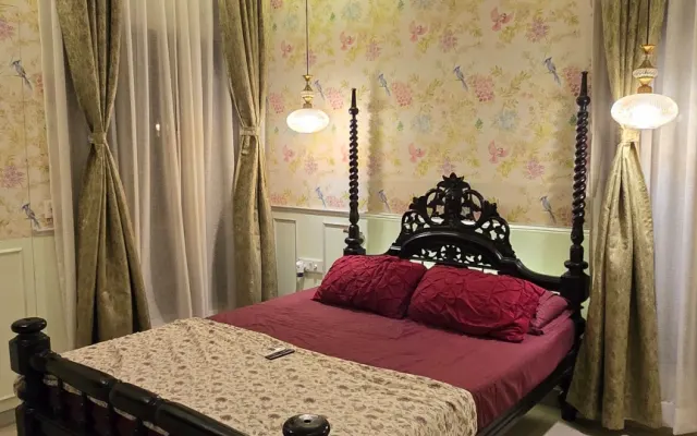 Quarto de estilo colonial num arranha-céus