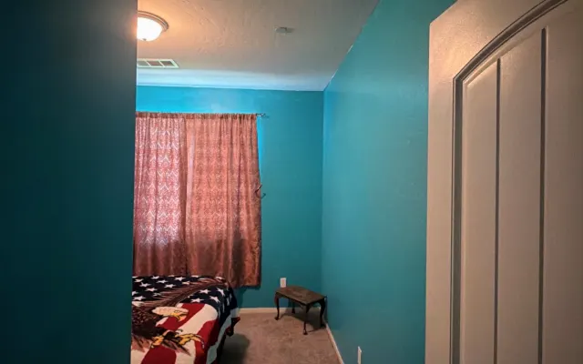 Chambre confortable dans une maison accueillante