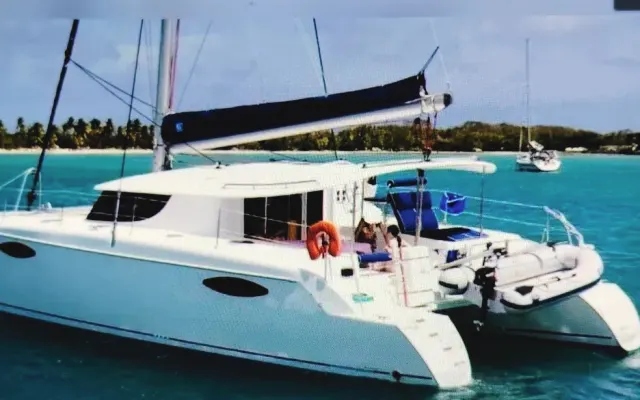 Catamaran at anchor in Anse Mitan Bay, Les Trois Îlets