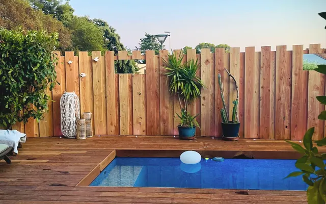 A beautiful, spacious bedroom in a house with a garden and... a...