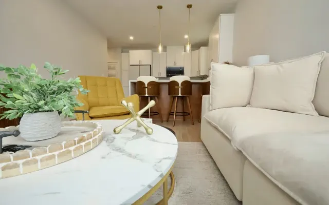 Prime Commercial Street Living – Stylish, Sun‐Filled 2BR Coastal Home