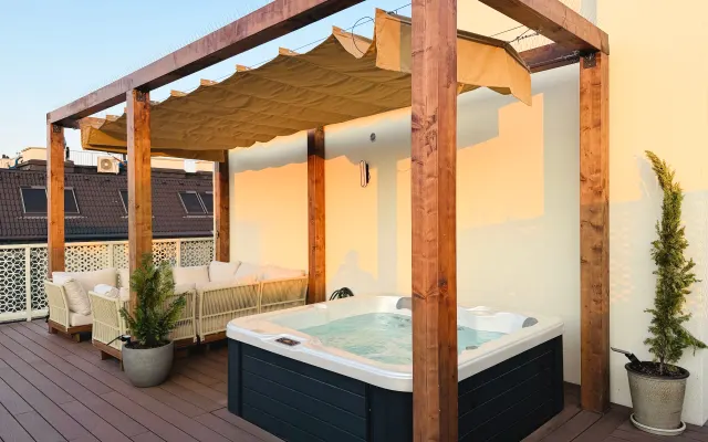 Refúgio na cobertura com banheira de hidromassagem e vista panorâmica