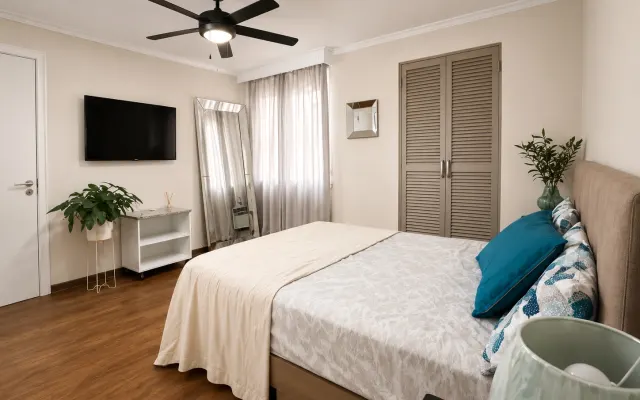 A centrally located room with a walk-in closet and bathroom is...