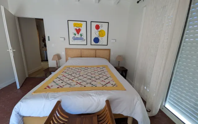 A spacious bedroom in a little paradise