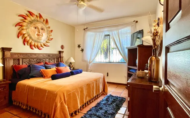 LUNA ROOM/Beautiful bedroom with a king-size bed, TV, private bathroom, and 