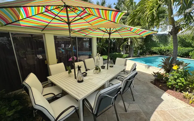 Maison de style « resort », plage, piscine chauffée, 10 couchages, une